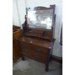 An Arts and Crafts oak dressing table, attributed to Liberty & Co., London