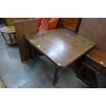 A Victorian mahogany extending dining table