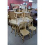 A pine drop leaf kitchen table and six beech chairs