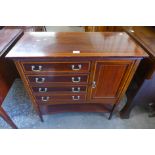 An Edward VII mahogany and satinwood inlaid music cabinet