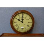 A beech cased circular wall clock, dial bearing Railway Regulator inscription