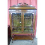 An Edward VII inlaid mahogany display cabinet