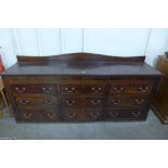 A George III inlaid mahogany dresser