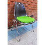 A Herman Miller chrome and fibreglass chair