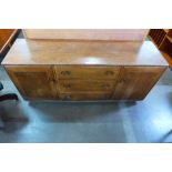 An Ercol elm Windsor sideboard