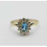 A 9ct gold, blue and white stone cluster ring, 1.5g, P