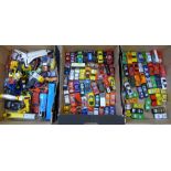 A collection of die-cast model vehicles, in three boxes