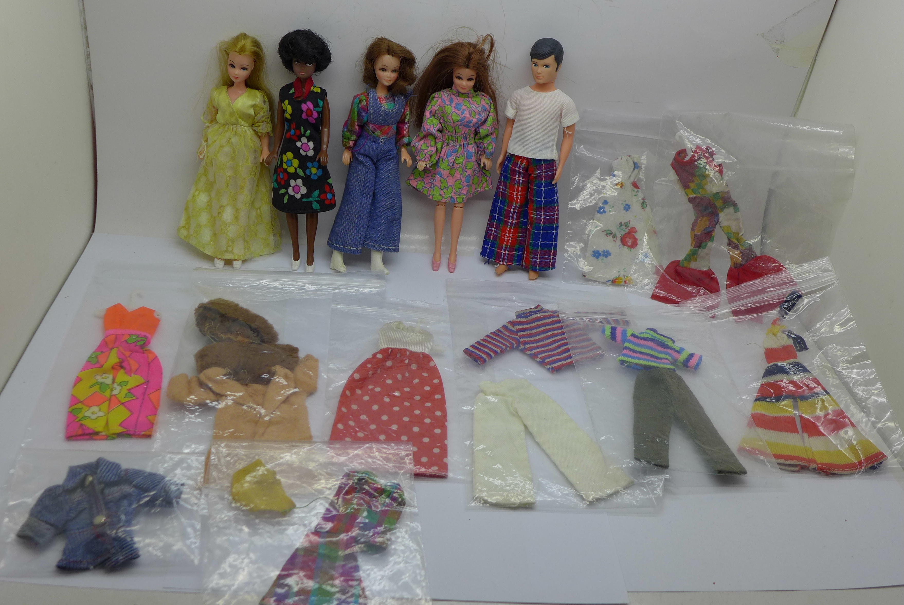 Five Pippa dolls comprising Mandy, Emma, Penny, Pete and Pippa, clothes and shoes