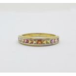 A silver gilt and twelve stone rainbow sapphire ring, with certificate, P/Q