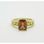 A silver gilt mystic twilight topaz and yellow sapphire ring, N, with certificate