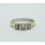 A 9ct white gold, three stone diamond trilogy ring, 3.2g, M