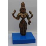 A bronze figure of a Thai deity mounted on a wooden base, 18cm