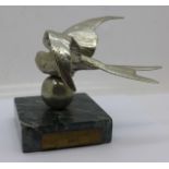 A Bluebird car mascot mounted on a marble base, inscription Bluebird 1930