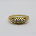 An 18ct gold and five stone diamond ring, 1.7g, N