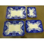 A set of four flow blue rectangular graduated serving plates **PLEASE NOTE THIS LOT IS NOT