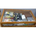 A collection of fly fishing equipment, eleven reels, flies, tying tools, etc.
