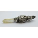 A novelty white metal and mother of pearl rattle in the form of a rabbit