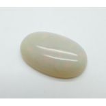 An unmounted opal, over 27 carats, approximately 18mm x 28mm