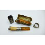 Two silver mounted cheroot holders and two silver walking cane mounts