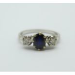 An 18ct white gold, sapphire and diamond ring, 3.3g, M
