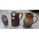 Two jugs, one marked G VI R 1945 and a vase, vase cracked **PLEASE NOTE THIS LOT IS NOT ELIGIBLE FOR
