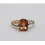 A 9ct gold, Oregon sunstone ring with diamond shoulders, 2.1g, N