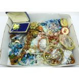 A collection of costume jewellery including bangles, brooches, etc.