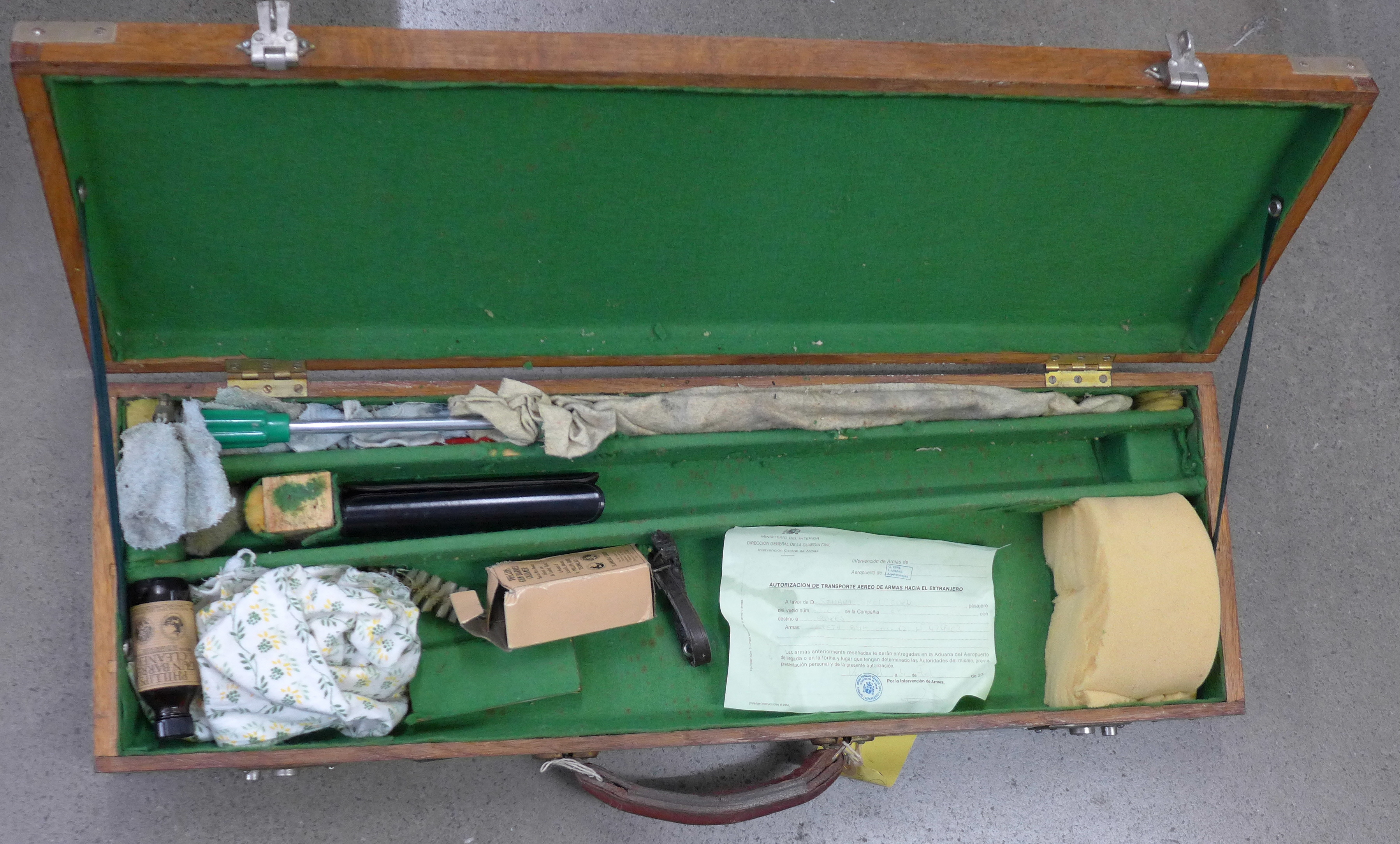 An oak gun case with brass fittings