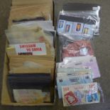 Stamps; a tray of stamps on stock cards and in packets