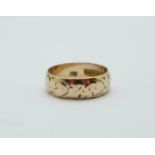 A 9ct gold wedding ring, Birmingham 1916, 3.3g, N