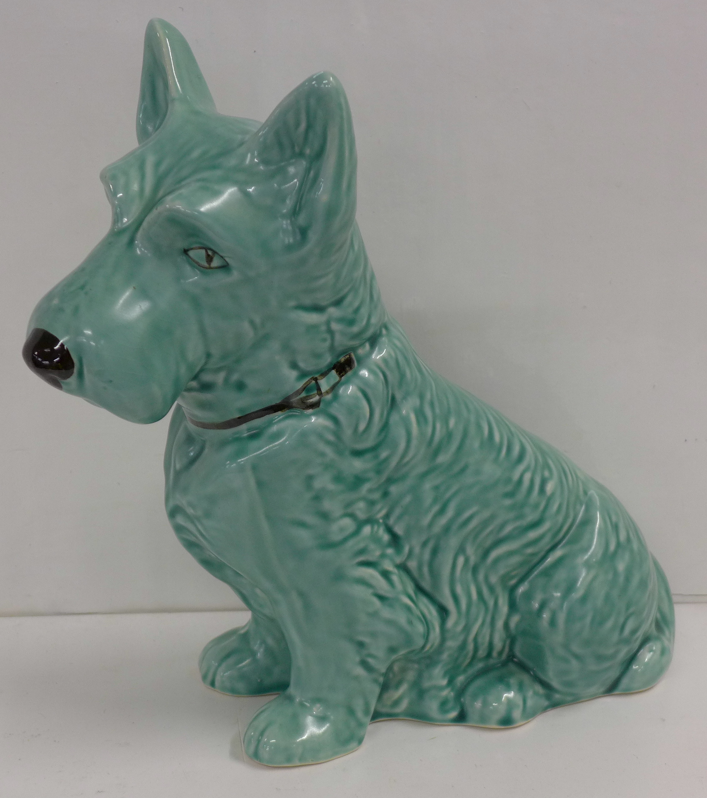 A large green Sylvac dog, 778504 1209 back stamp, 28cm