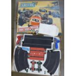 A Scalextric Grand Prix 50 Set model motor racing game, boxed