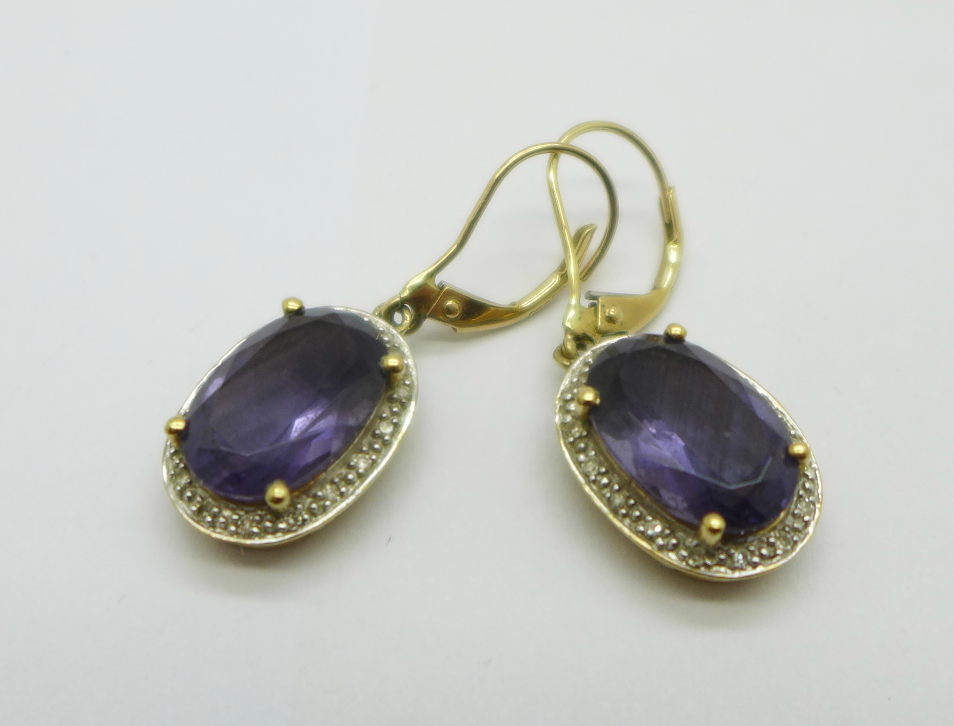 A pair of 9ct gold, amethyst and diamond pendant earrings, 4.1g, amethysts approximately 8mm x 11mm