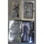 Two boxed action figures, Army National Guard Private 1st class Rosanna Jones and N.Y.P.D. Emergency