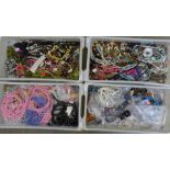 Four trays of costume jewellery