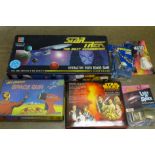 A Star Wars figure and 2005 collectors pins, a Jet Harrison Space Gun, a Spaceman water pistol, a