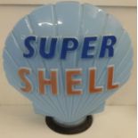 A Super Shell blue glass petrol pump globe, a/f, 44cm (base chipped)