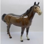 A Beswick brown hunter mare, looking to the right