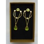 A pair of silver gilt, peridot and zircon Art Nouveau style drop earrings