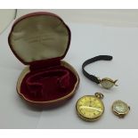 A 14k gold cased fob watch and two 9ct gold cased lady's wristwatch heads
