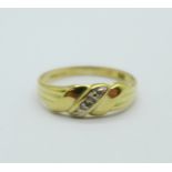 A 9ct gold ring set with one small diamond, 0.9g, J