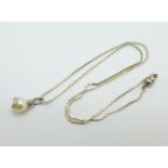 A 9ct white gold, pearl and diamond pendant on a white metal chain with magnetic fastener