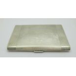 A silver Dunhill cigarette case, London 1947, David Sutton & Sons, 192g, (scratches and shallow