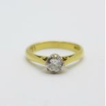 An 18ct gold diamond solitaire ring, 0.35 carat weight, marked in the shank, 3.5g, L, (some claws