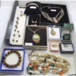 A collection of silver mounted stone set jewellery and a tigers eye bracelet