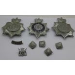 A collection of Nottingham and Nottinghamshire Police helmet and shoulder badges