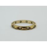 A 9ct gold eternity ring, 1.8g, N