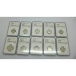 Ten Egyptian silver coins, one 1917, nine 1929, cased and graded