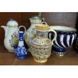 A crescent china jardiniere, a German coffee pot, lidded jug, one other jug and a flow blue vase