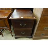 A mahogany two drawer filing cabinet